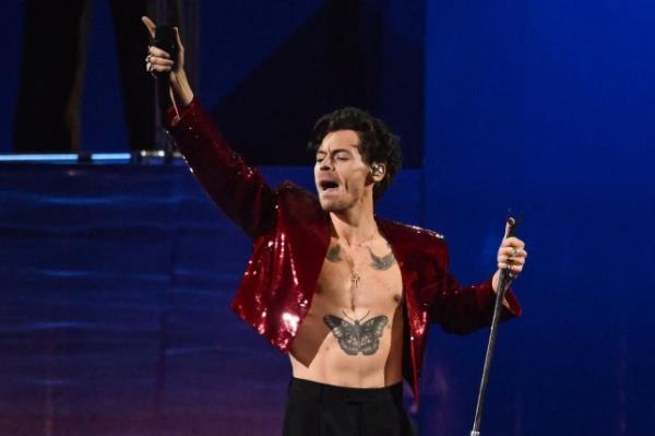 (FILES) British singer Harry Styles performs on stage during BRIT Awards 2023 ceremony and live show in Lo<em></em>ndon on February 11, 2023. Harry Styles is performing in Paris suburb of Saint-Denis on June 1, 2023. (Photo by Ben Stansall / AFP) / RESTRICTED TO EDITORIAL USE NO POSTERS NO MERCHANDISE NO USE IN PUBLICATIONS DEVOTED TO ARTISTS (Photo by BEN STANSALL/AFP via Getty Images)