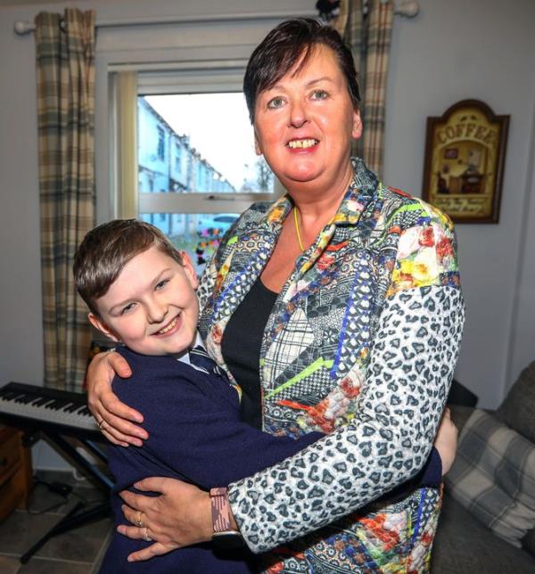 Callum havin<em></em>g a cuddle with mum Fiona Mulhern