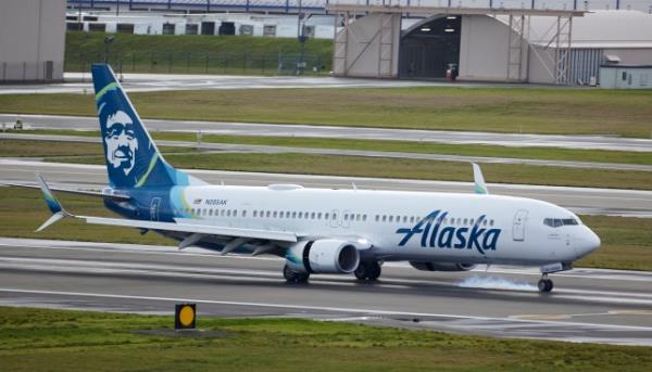 Alaska Airlines flight 337 from Fort Lauderdale, Fla. a Boeing 737-900, lands at Portland Internatio<em></em>nal Airport in Portland, Ore., Saturday, Jan. 6, 2024. The FAA has ordered the temporary grounding of Boeing 737 MAX 9 aircraft after part of the fuselage blew out during a flight. (AP Photo/Craig Mitchelldyer)