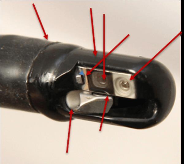 Close up image of endoscope. Red arrows each indicate a different surface on the scope.