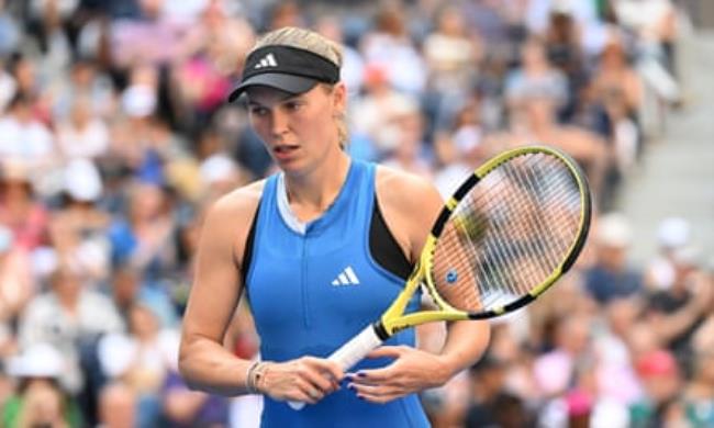 Caroline Wozniacki in action against Coco Gauff