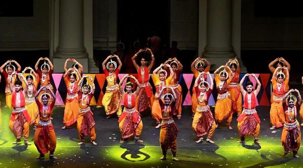 Students of 'Diksha Manjari' dance school peforms during the celebration of Vasant Utsav, at the Indian Museum in Kolkata.