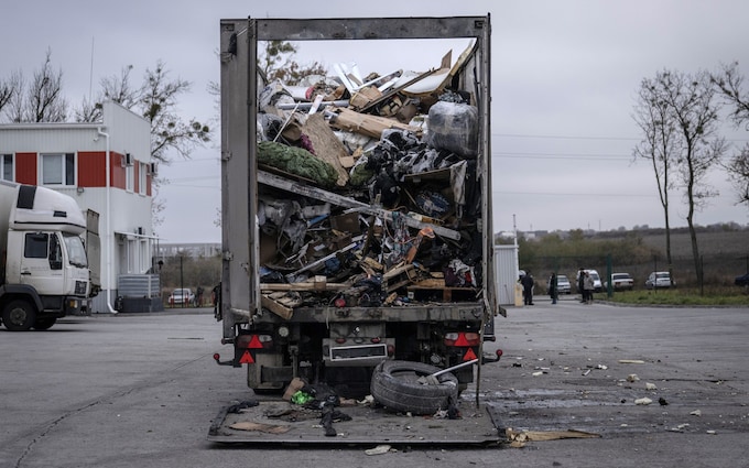 Debris after Russia launches a missile attack from the S-300 anti-aircraft missile system at the 'Nova Poshta' terminal in the village of Korotych, Kharkiv 