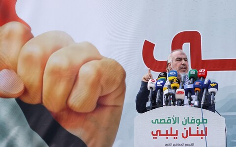 Ghazi Hamad, a member of Hamas Political Office, speaks during a protest in solidarity with Palestinians in Gaza