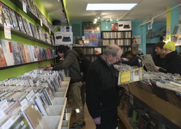 Customers search for music at Rattleback Records in Anderso<em></em>nville on Saturday, Nov. 25, 2023.